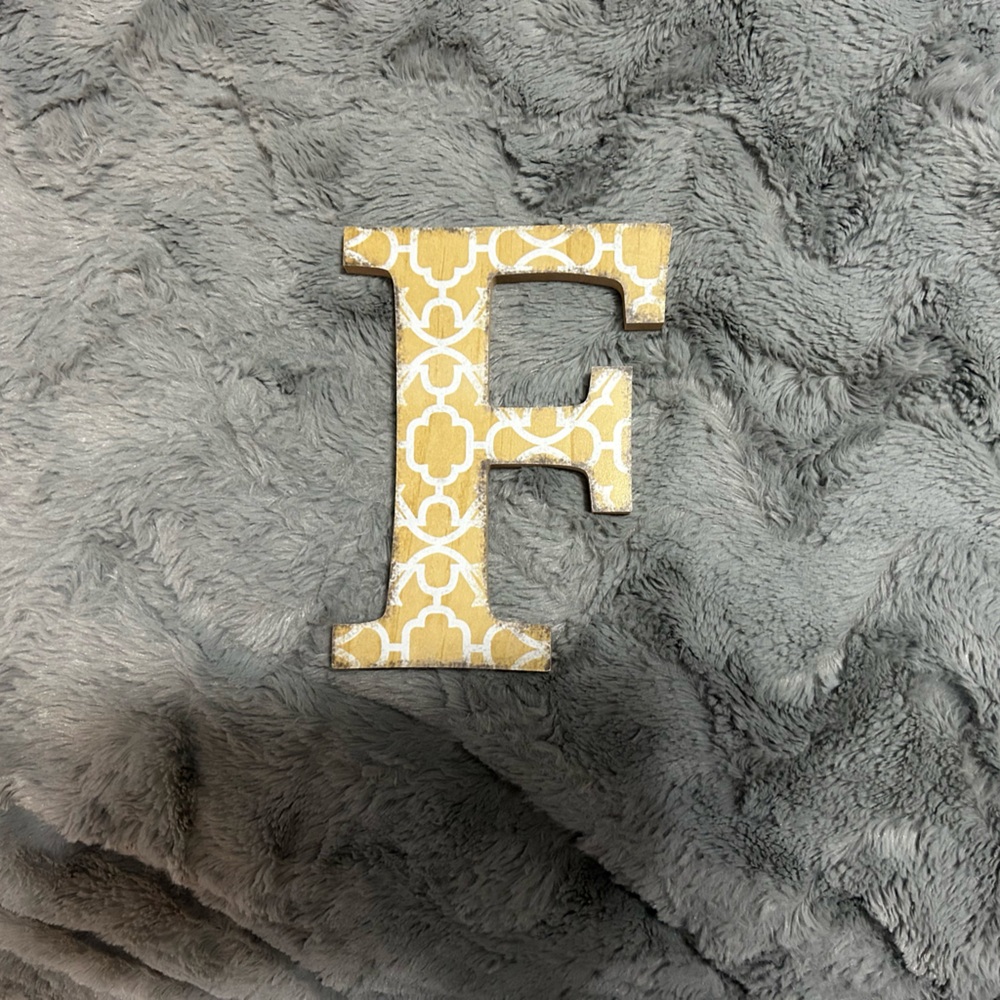 Yellow and White Decorative F Letter